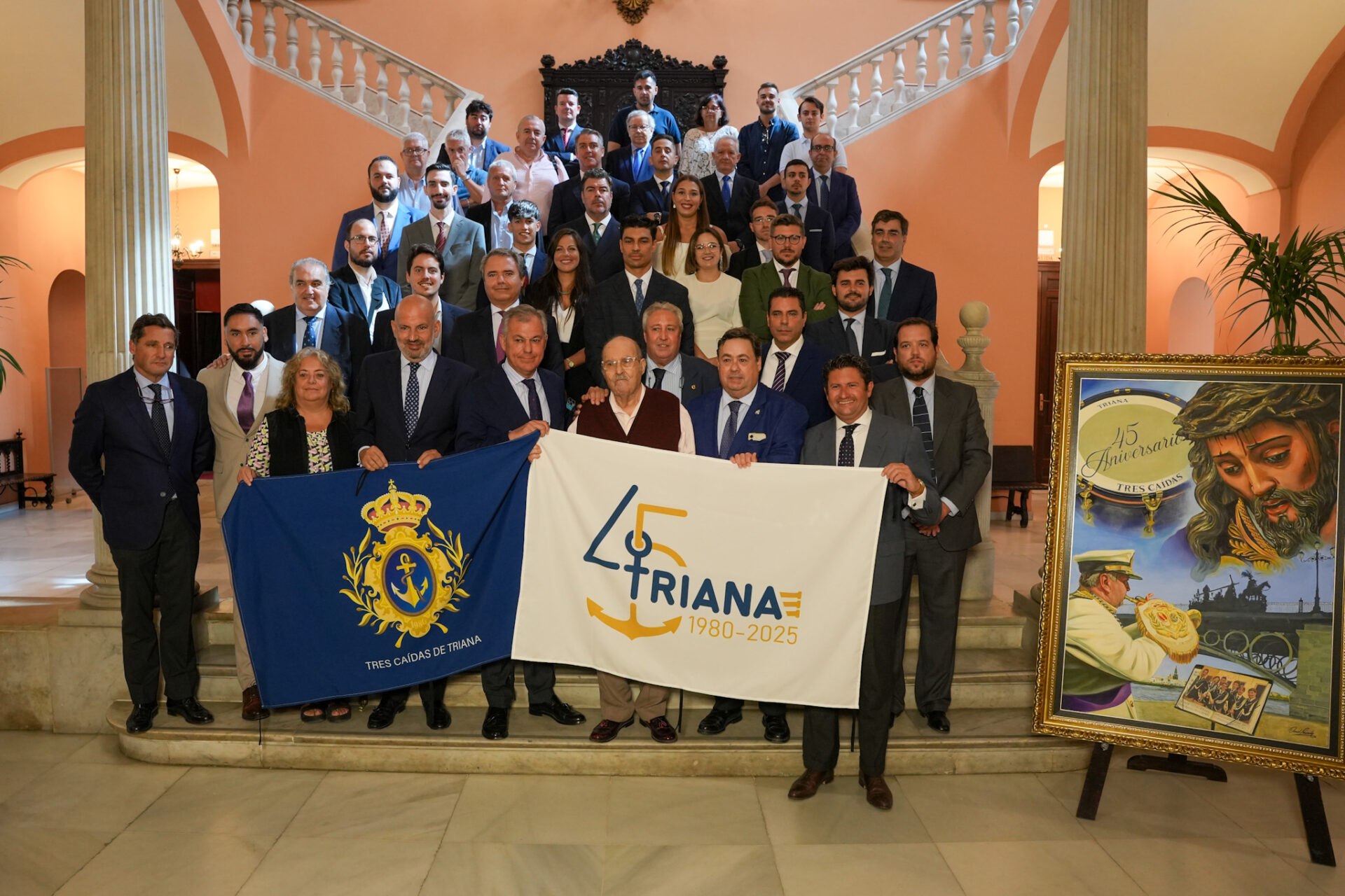 El alcalde de Sevilla preside la presentación del logo y cartel del 45.º aniversario de la Banda de las Tres Caídas de Triana